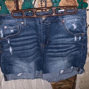 blue jean shorts with little rips